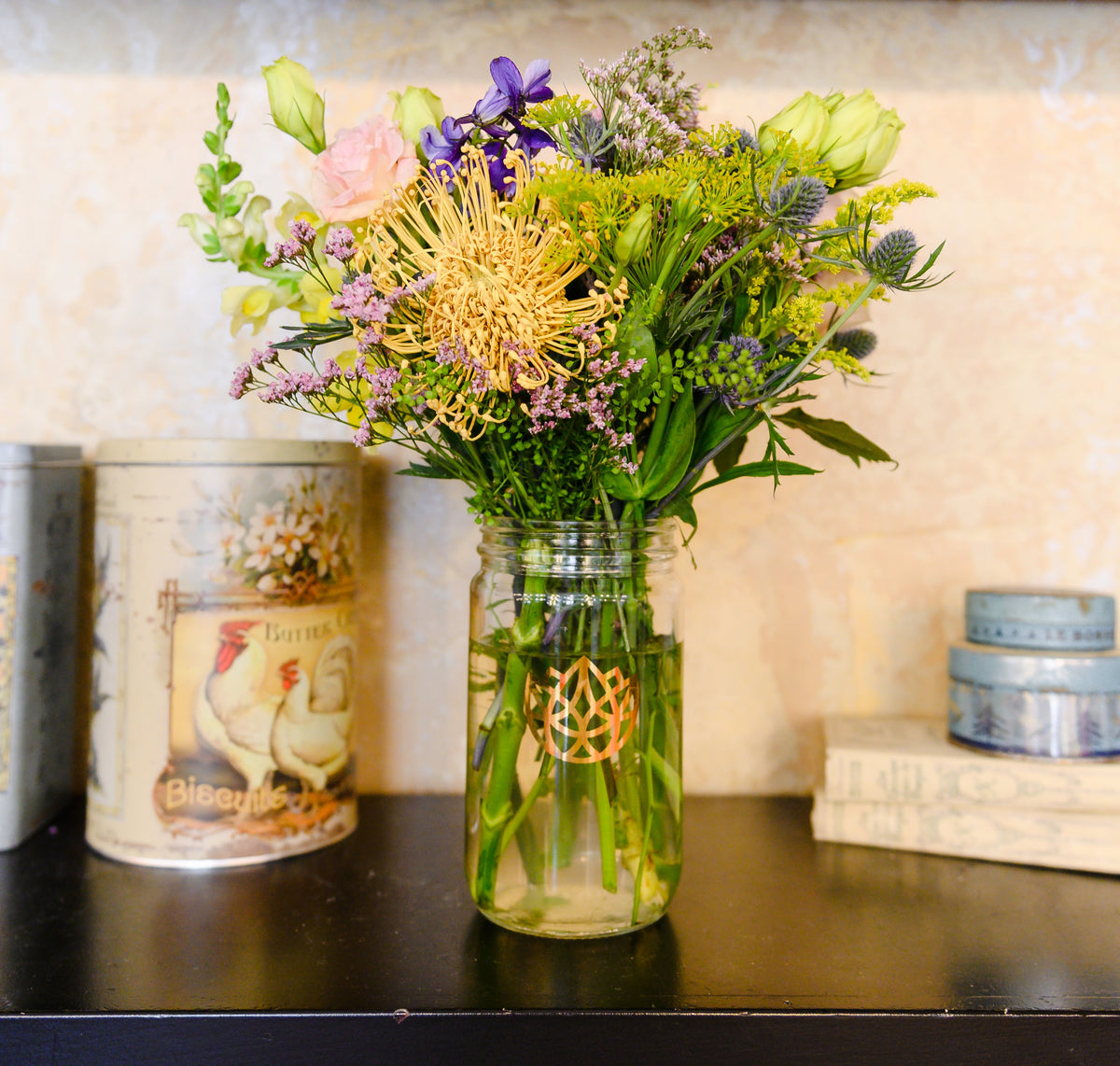 Seasonal flower subscription arrangement in glass jar from Flowers for Dreams