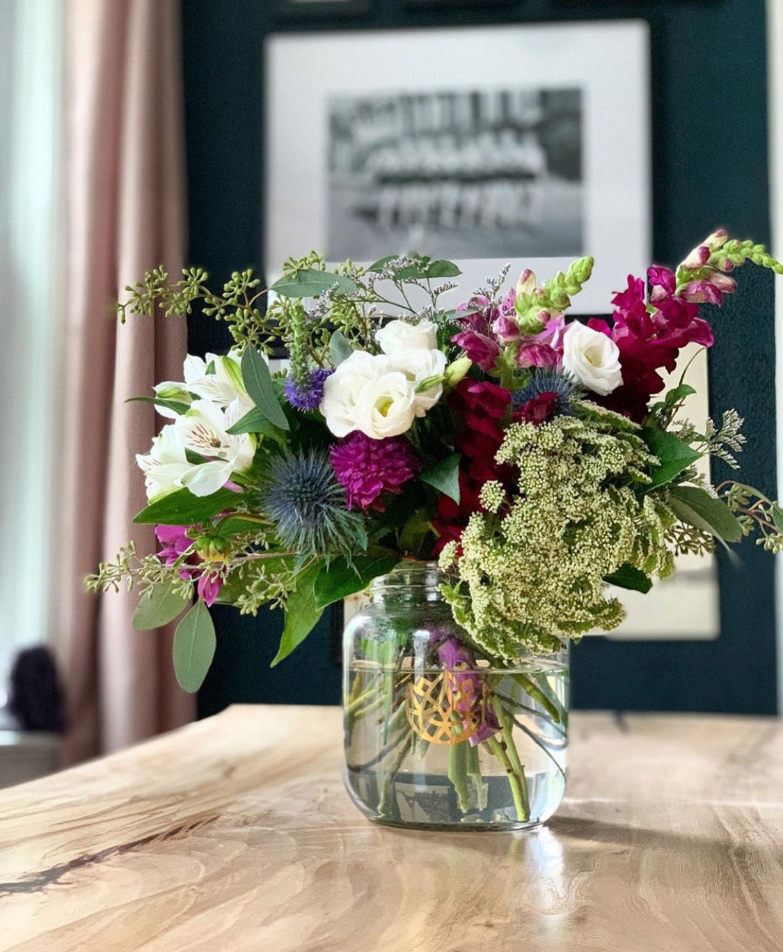 Seasonal floral arrangement in glass jar from Flowers for Dreams subscription delivery