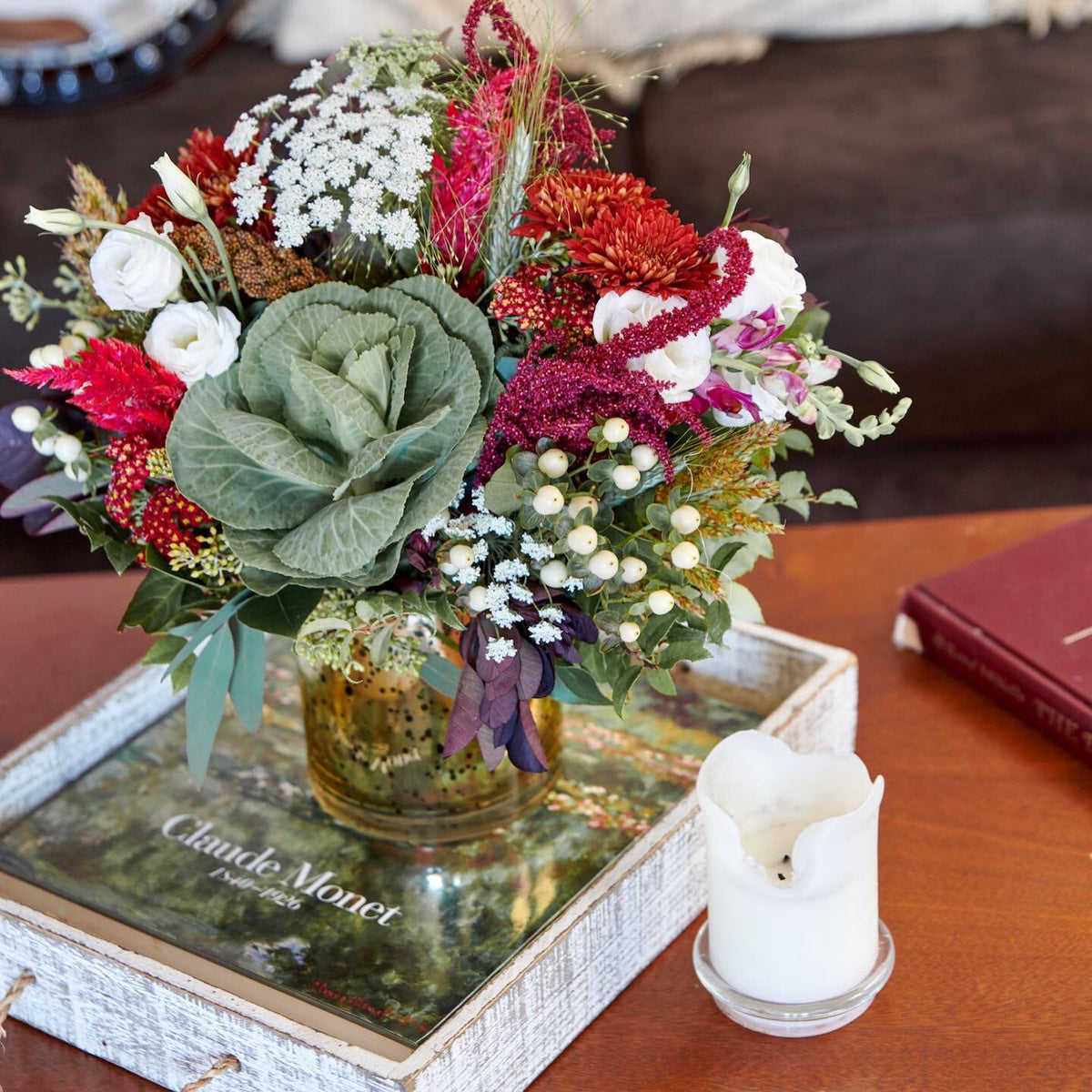 Seasonal flower subscription arrangement in vase on table from Flowers for Dreams